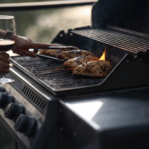 BBQ cooking chicken outdoors